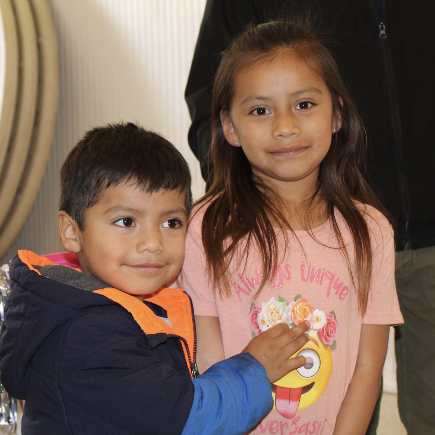 Smiling children at a Harvest Community Center event